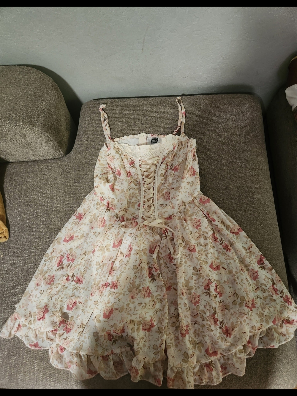 Floral sundress with a lace-up bodice look